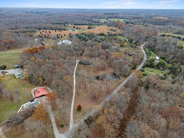 birds eye view of property featuring a rural view