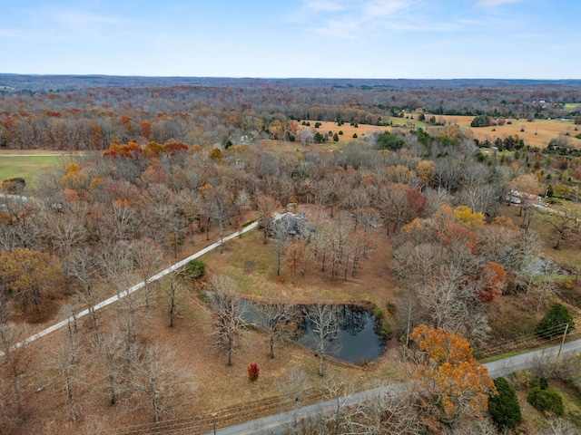 birds eye view of property with a water view and a rural view