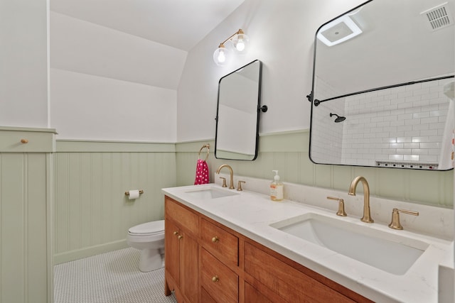 bathroom with tile patterned floors, vanity, and toilet