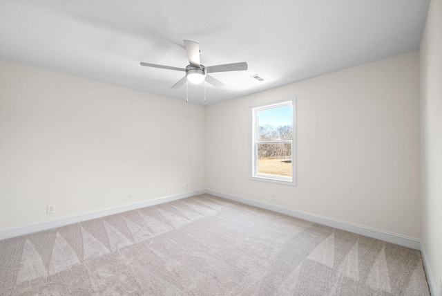 empty room with light colored carpet