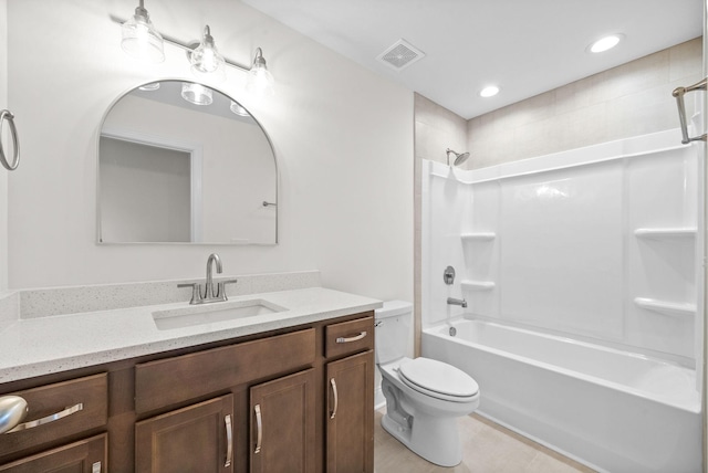 full bathroom featuring vanity, shower / bathing tub combination, and toilet