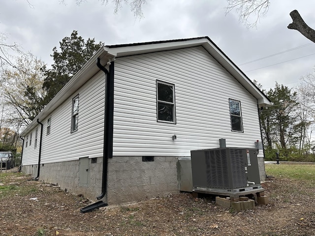 view of property exterior featuring central AC