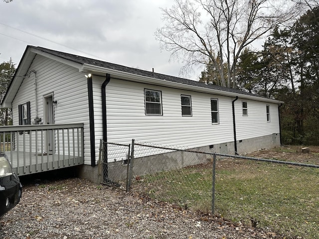 view of property exterior featuring a deck