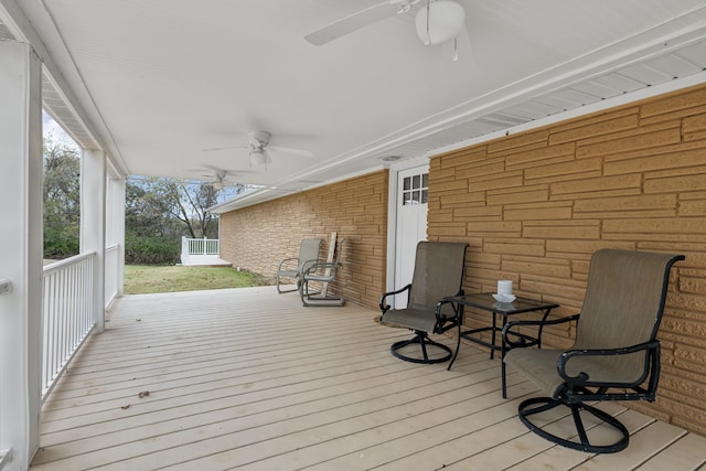 wooden terrace with a porch