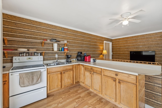 kitchen featuring kitchen peninsula, white range with electric stovetop, ceiling fan, sink, and light hardwood / wood-style floors