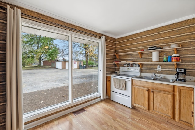 kitchen with white range with electric cooktop, crown molding, sink, and light hardwood / wood-style floors