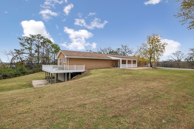 exterior space featuring a patio and a wooden deck