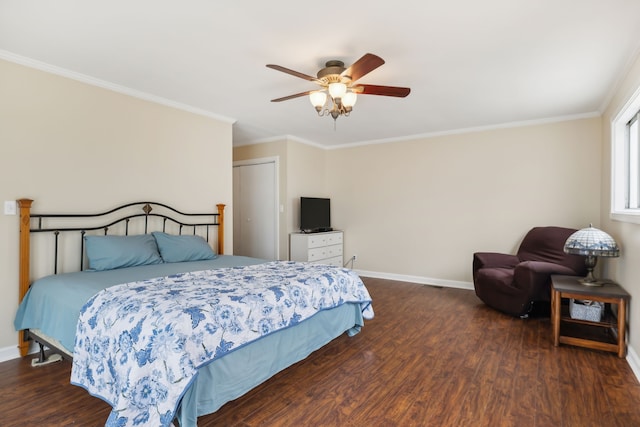 bedroom featuring a closet, crown molding, ceiling fan, and dark wood-type flooring