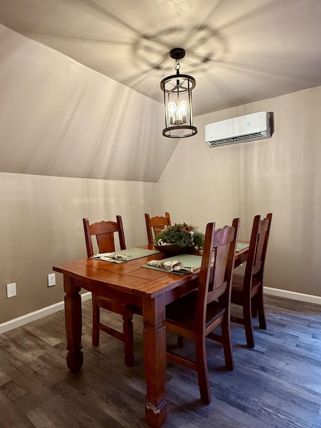 dining area featuring lofted ceiling, dark hardwood / wood-style flooring, a wall mounted air conditioner, and an inviting chandelier