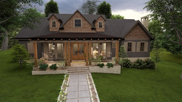 back house at dusk with covered porch and a lawn