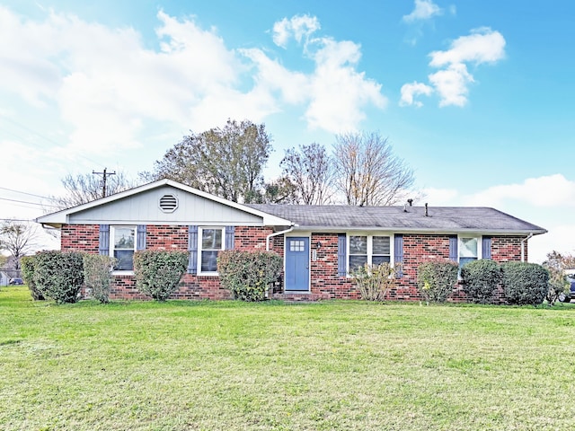 ranch-style house with a front yard