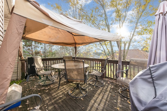 wooden terrace with area for grilling