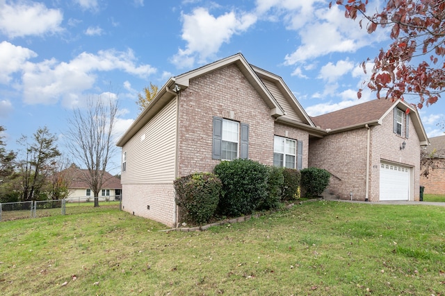 view of property exterior featuring a yard and a garage