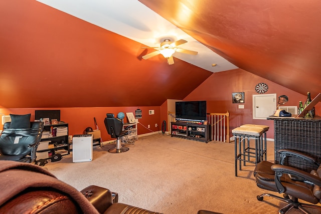 interior space featuring ceiling fan and vaulted ceiling