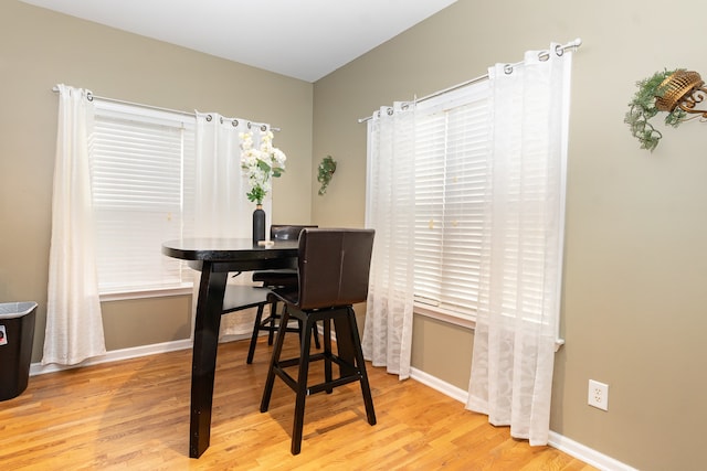 dining room with light wood-type flooring