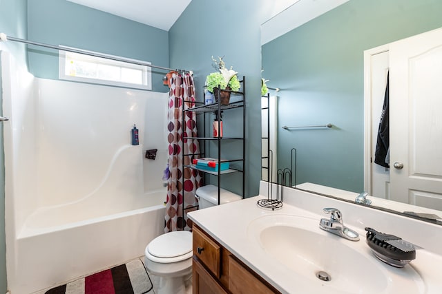 full bathroom featuring tile patterned flooring, vanity, toilet, and shower / bath combo with shower curtain