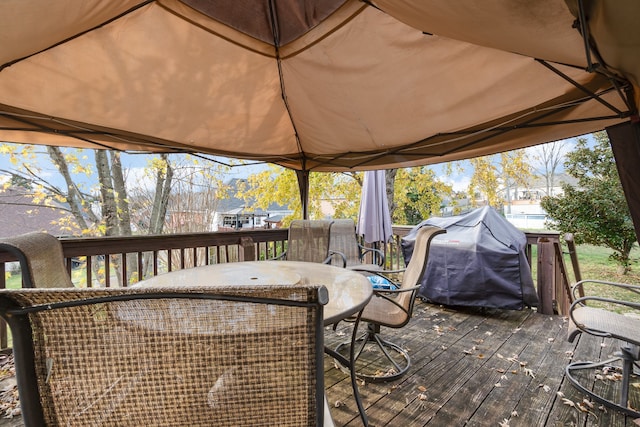 wooden deck with area for grilling