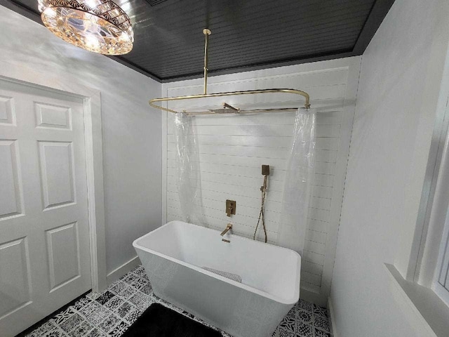 bathroom with tile patterned floors