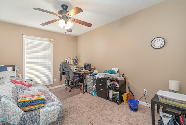 office space with ceiling fan and light colored carpet