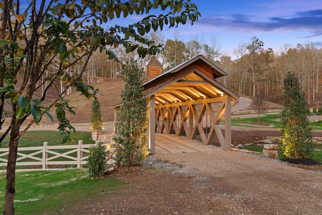 view of gate at dusk