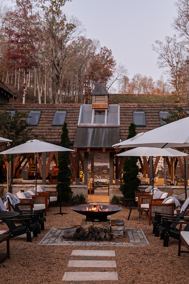 view of patio with an outdoor fire pit