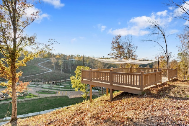 surrounding community featuring a wooden deck