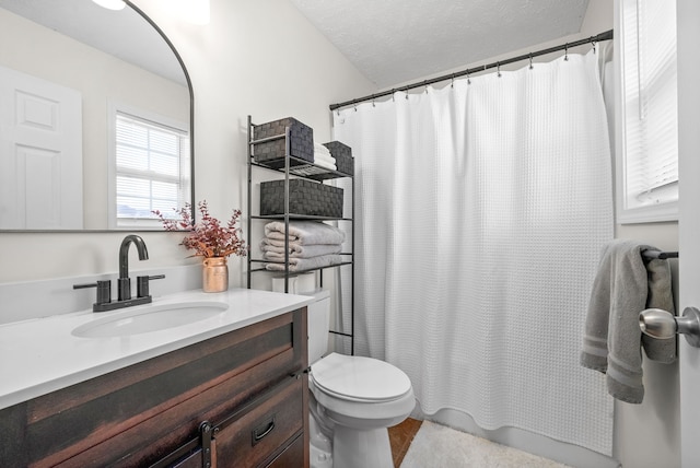 bathroom with walk in shower, a textured ceiling, toilet, vanity, and hardwood / wood-style flooring