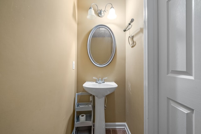 bathroom with tile patterned flooring