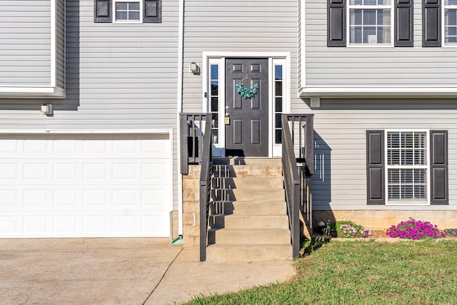 property entrance featuring a garage