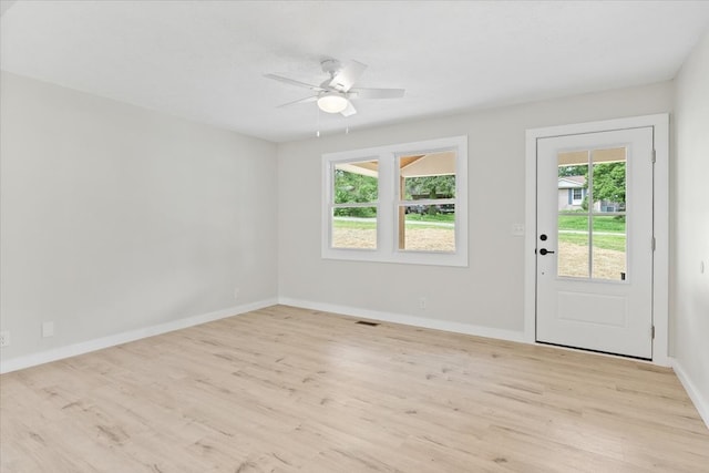 interior space with ceiling fan and light hardwood / wood-style flooring