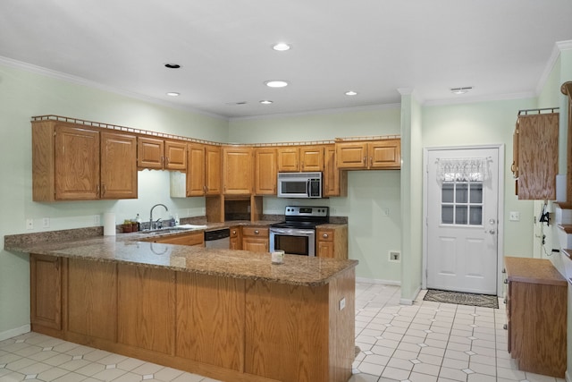 kitchen featuring stone counters, sink, ornamental molding, appliances with stainless steel finishes, and kitchen peninsula