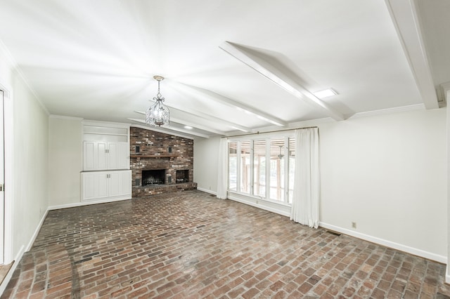 unfurnished living room featuring brick floor, beam ceiling, a fireplace, and baseboards