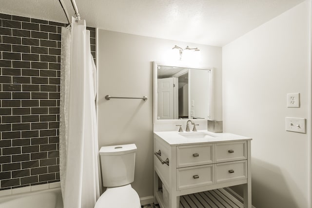 bathroom with toilet, shower / bath combo with shower curtain, a textured ceiling, and vanity