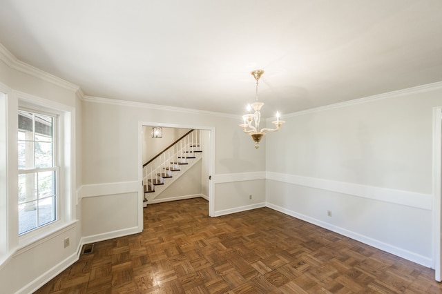 spare room with baseboards, visible vents, stairway, an inviting chandelier, and crown molding