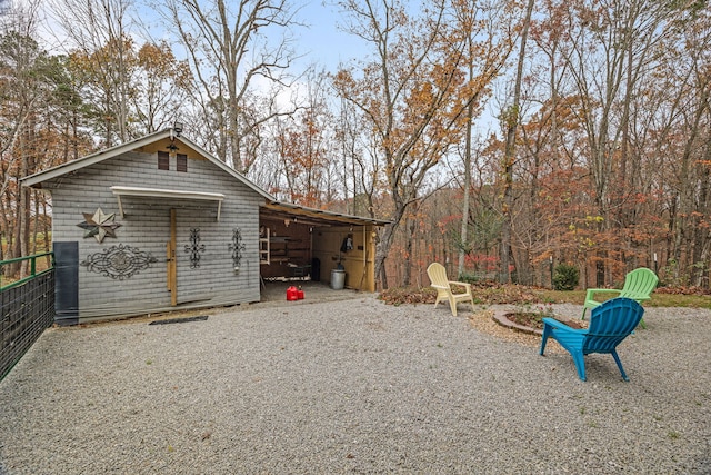 view of outbuilding with a carport