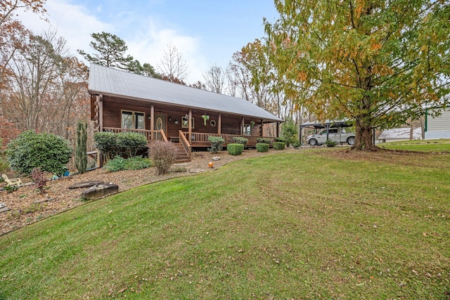 view of front facade with covered porch and a front yard