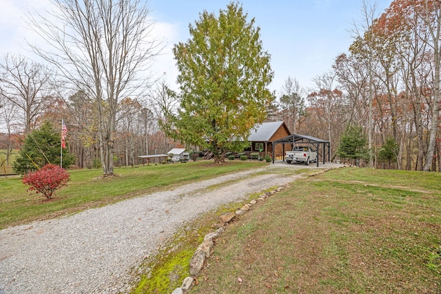 view of front of property featuring a carport and a front yard