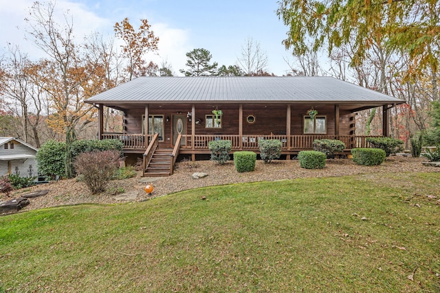 view of front of property with a front lawn and a porch