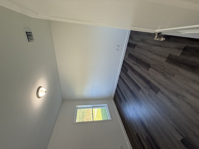 unfurnished room featuring dark hardwood / wood-style floors