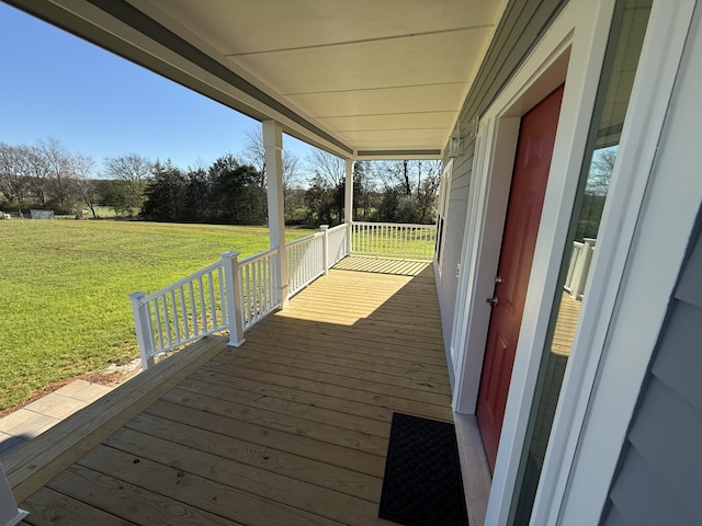 deck featuring a yard