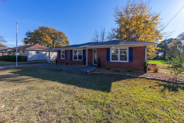 ranch-style house with a front yard