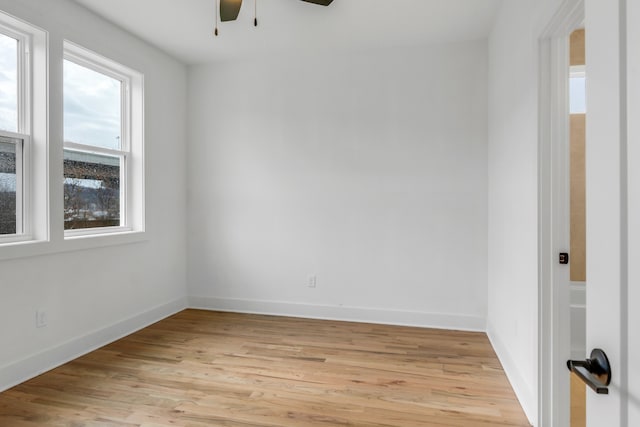 unfurnished room with ceiling fan and light hardwood / wood-style flooring