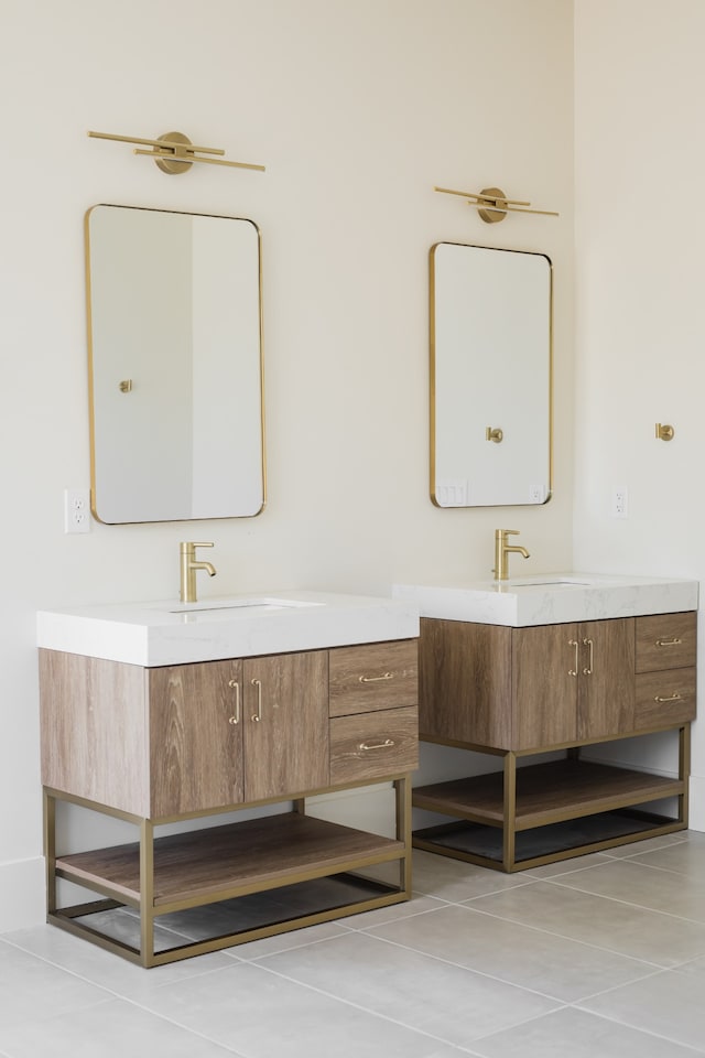 bathroom with tile patterned floors and vanity