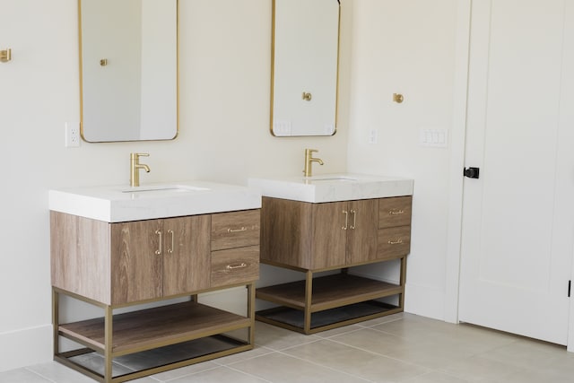 bathroom featuring tile patterned floors and vanity