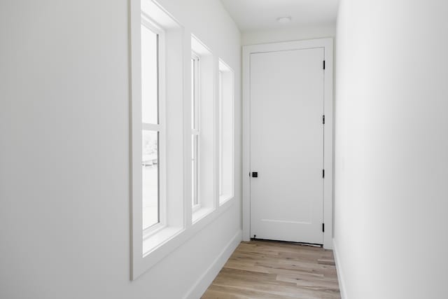 doorway to outside with light hardwood / wood-style flooring