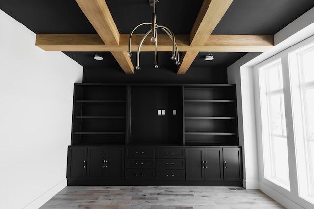 interior space with hardwood / wood-style flooring and a notable chandelier