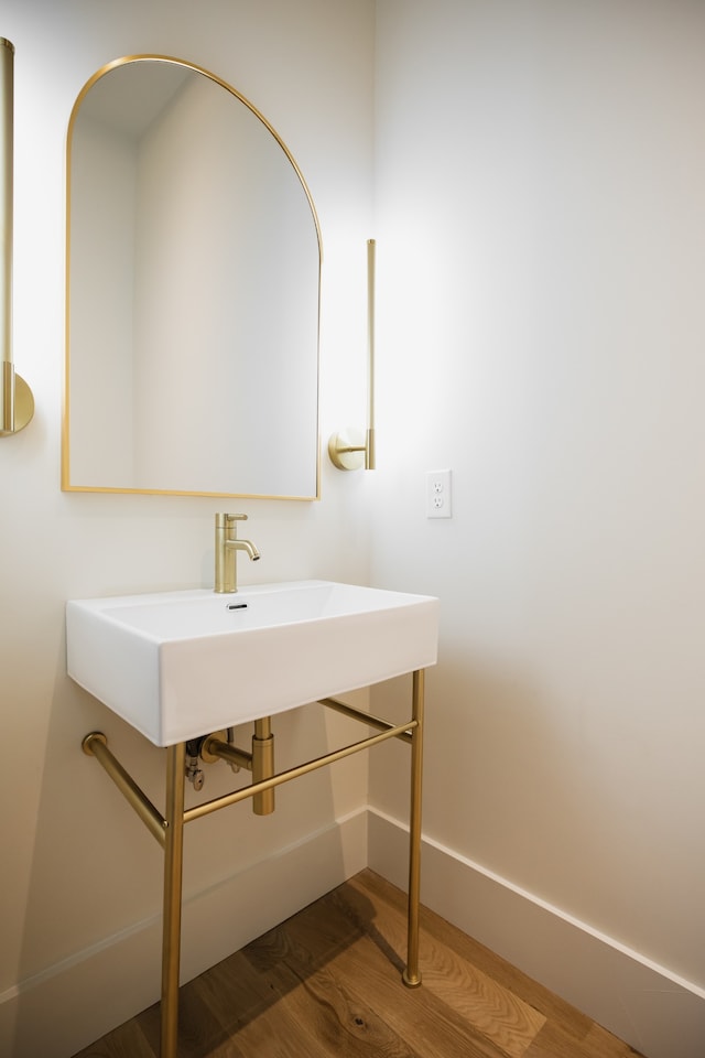 bathroom featuring hardwood / wood-style floors and sink