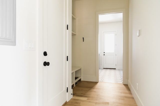 mudroom with light hardwood / wood-style flooring