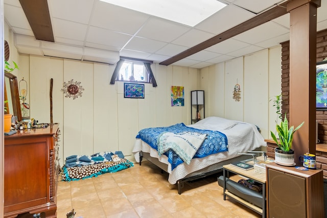 bedroom featuring a paneled ceiling