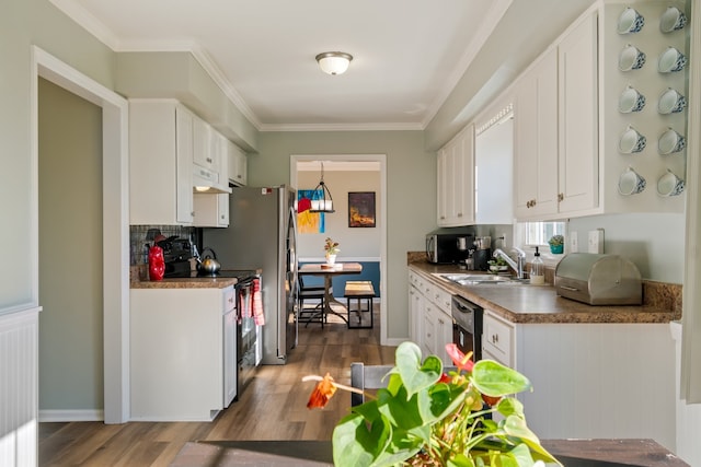 kitchen featuring electric range, dark hardwood / wood-style floors, sink, and white cabinets